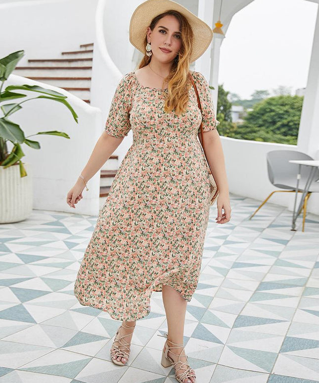 Sukienka plus size w kwiatki za kolano